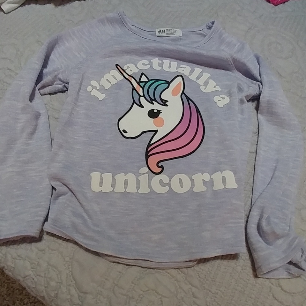 Light unicorn sweater